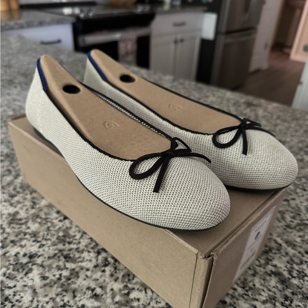 NWT Rothy’s ballet flats never worn.